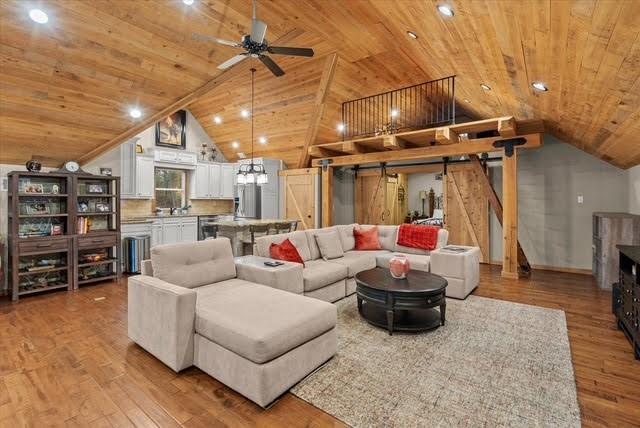 5320 North Helton Road Winston, GA 30187 - Photo 22 of 54 a living room with furniture and a flat screen tv