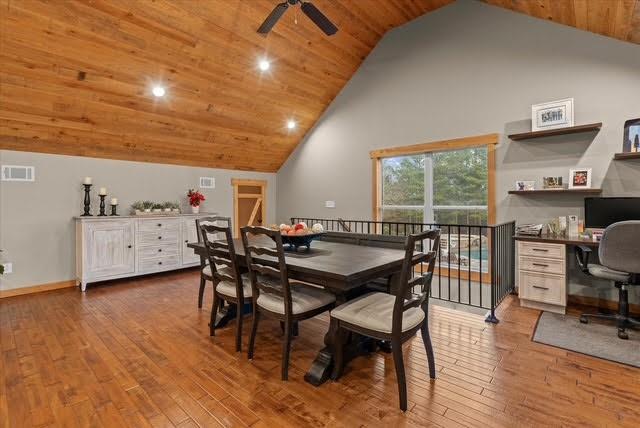 5320 North Helton Road Winston, GA 30187 - Photo 28 of 54 a dining room with furniture and wooden floor