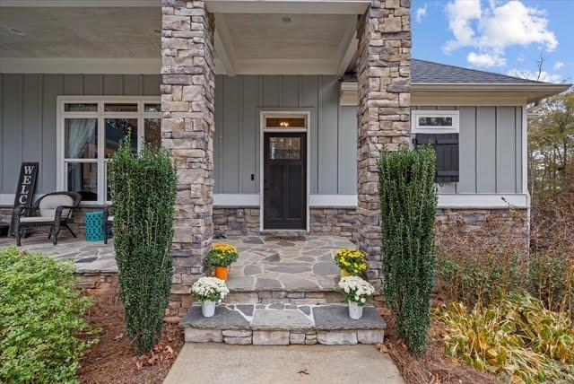 5320 North Helton Road Winston, GA 30187 - Photo 34 of 54 a front view of a house with outdoor seating