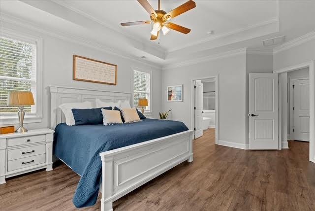 5320 North Helton Road Winston, GA 30187 - Photo 38 of 54 a spacious bedroom with a bed and a chandelier