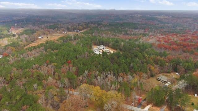 5320 North Helton Road Winston, GA 30187 - Photo 47 of 54 a view of a lake in middle of forest