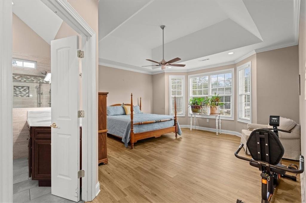 5320 North Helton Road Winston, GA 30187 - Photo 10 of 54 a bedroom with furniture and a window