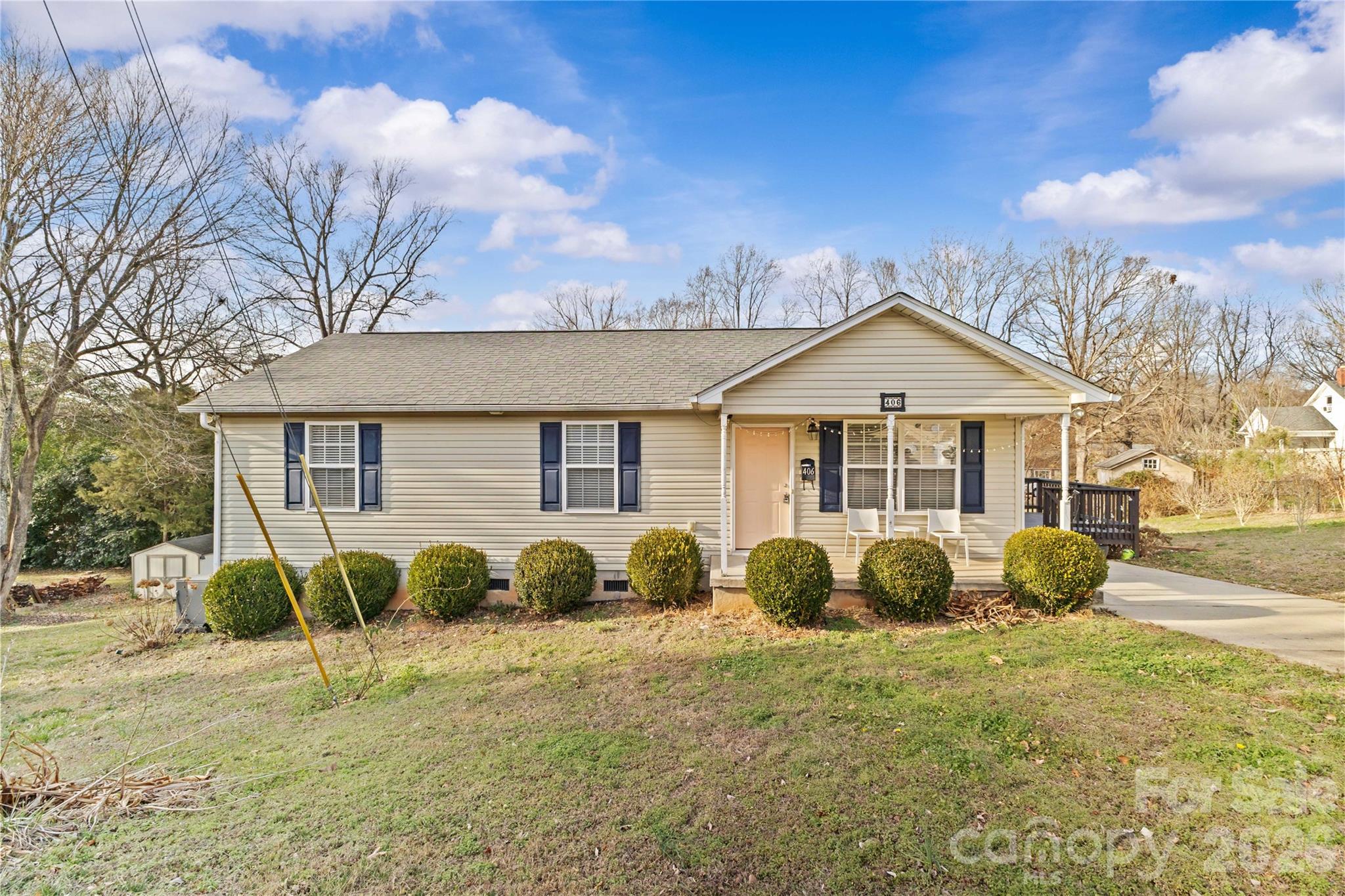 406 Calhoun Street Fort Mill, SC 29715 - Photo 1 of 44 a front view of a house with garden