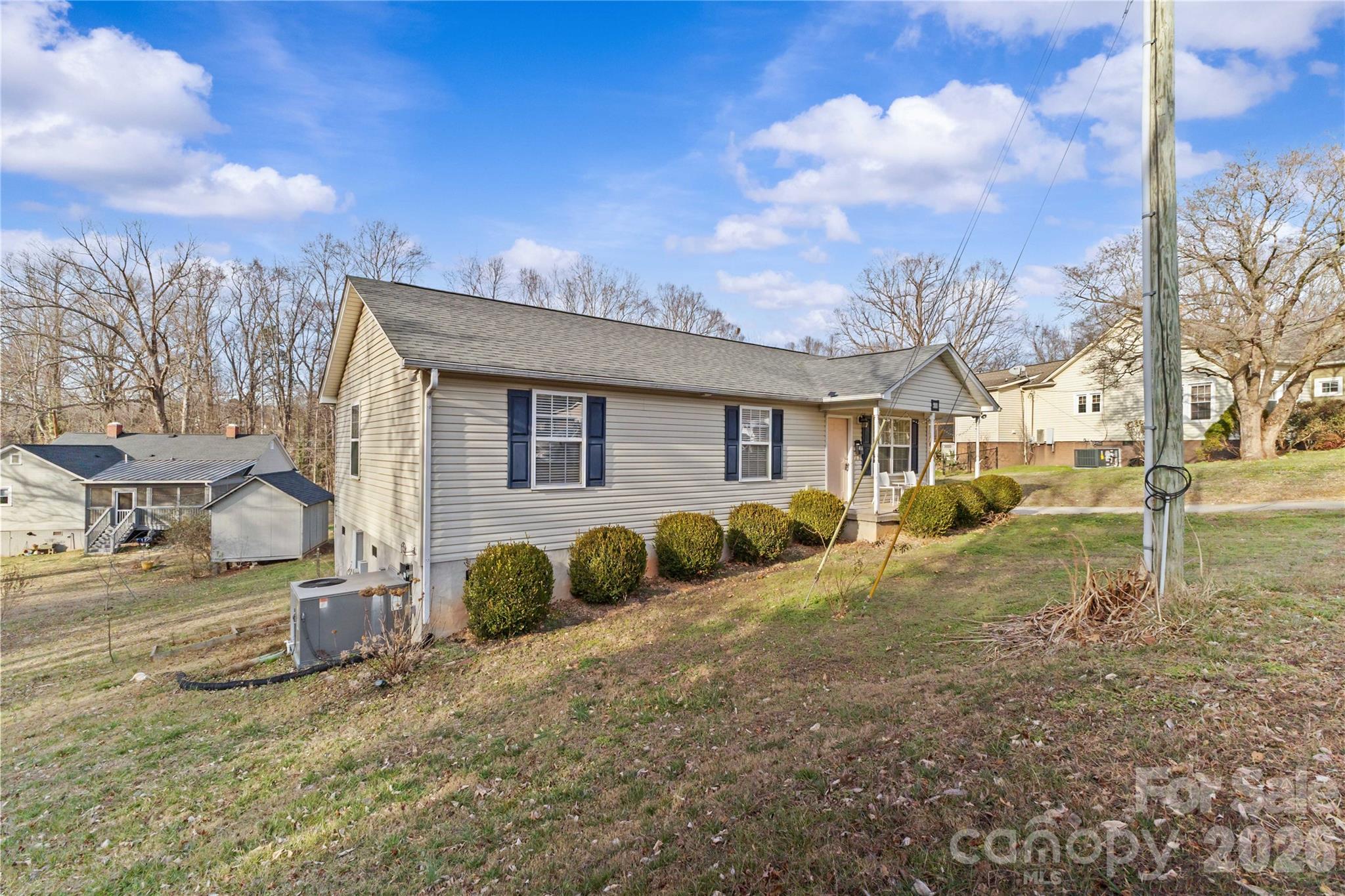 406 Calhoun Street Fort Mill, SC 29715 - Photo 4 of 44 a view of a house with a backyard