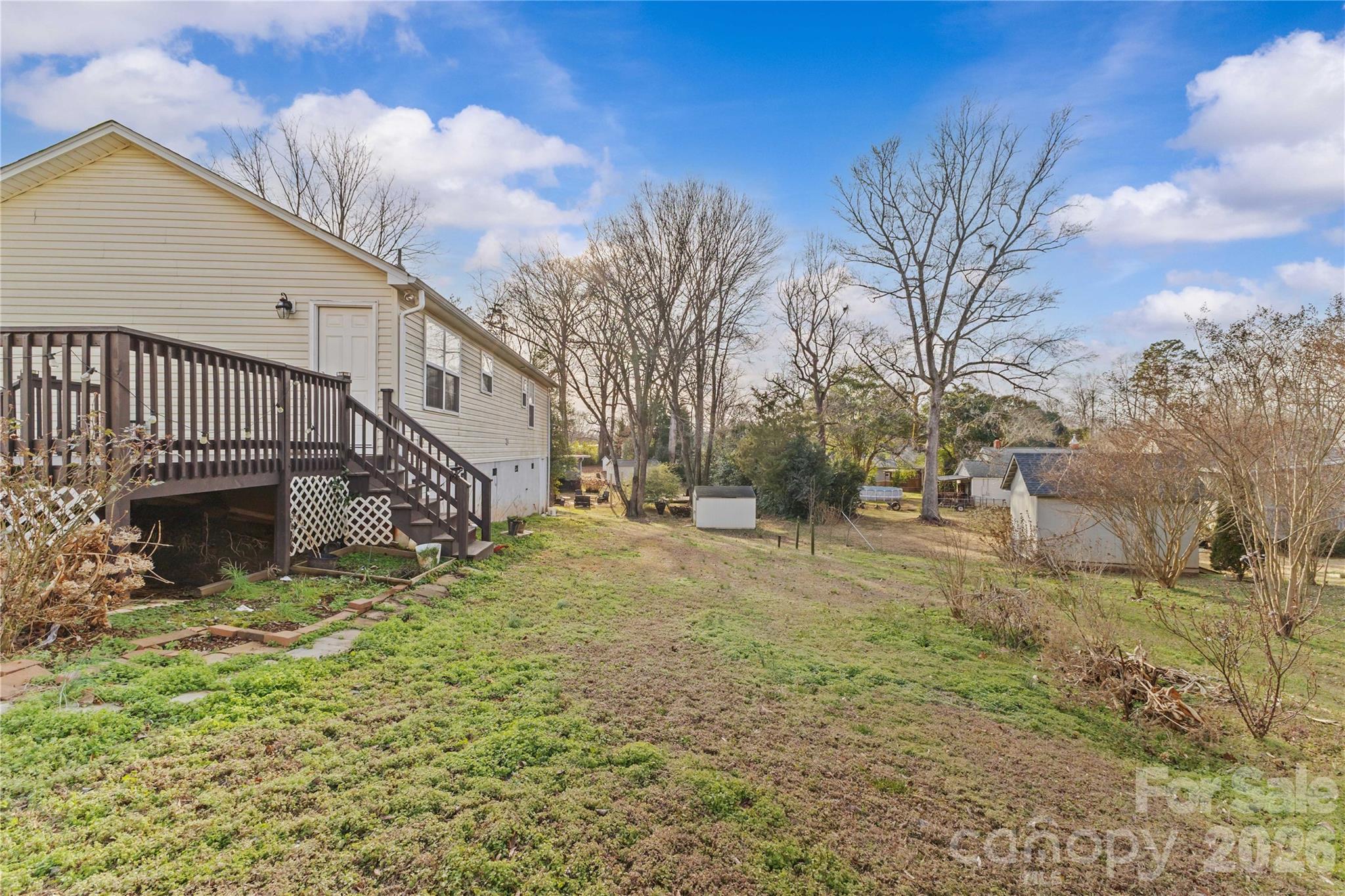 406 Calhoun Street Fort Mill, SC 29715 - Photo 42 of 44 a view of a house with a yard