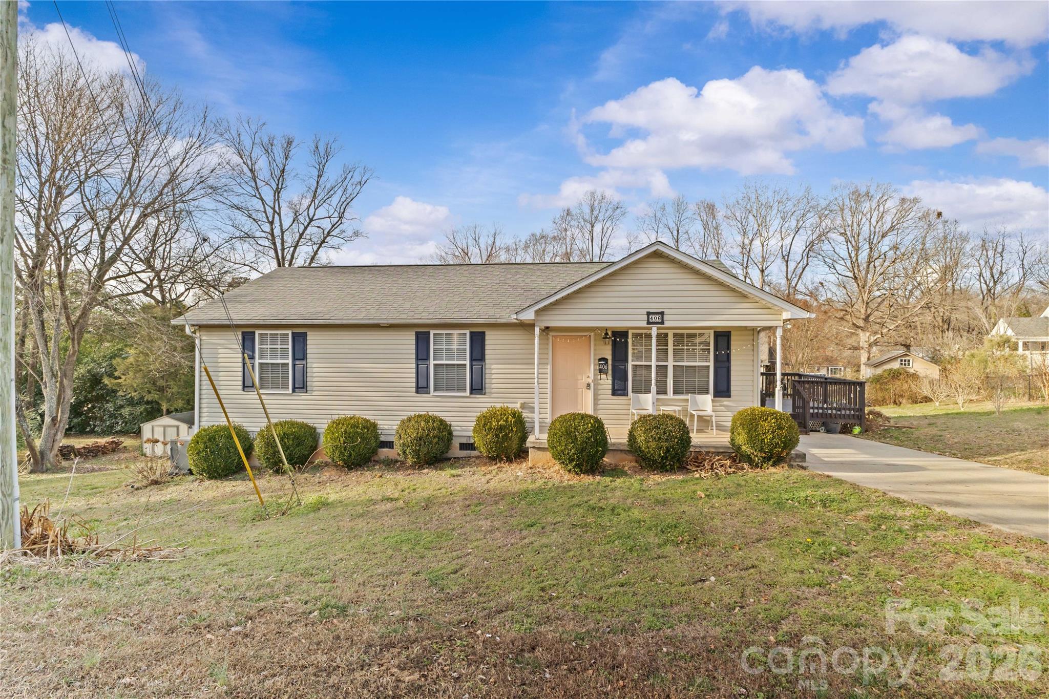 406 Calhoun Street Fort Mill, SC 29715 - Photo 5 of 44 a front view of a house with garden