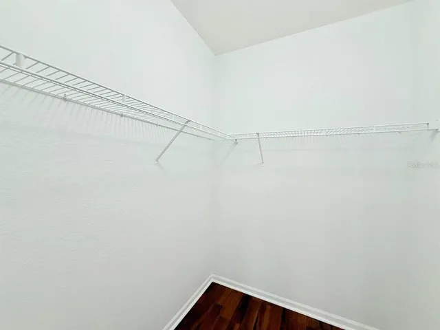 a view of a room with racks on the wall