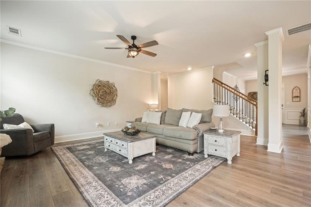 6915 Rambling Vale Dawsonville, GA 30534 - Photo 11 of 63 a living room with furniture and a rug