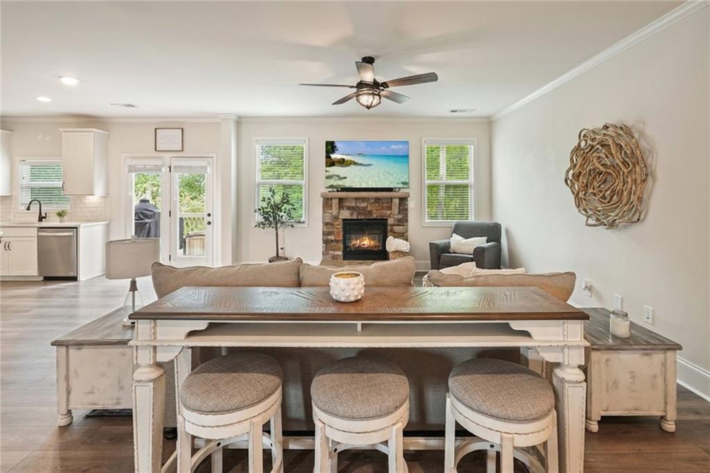 6915 Rambling Vale Dawsonville, GA 30534 - Photo 13 of 63 a dining table with chairs and window