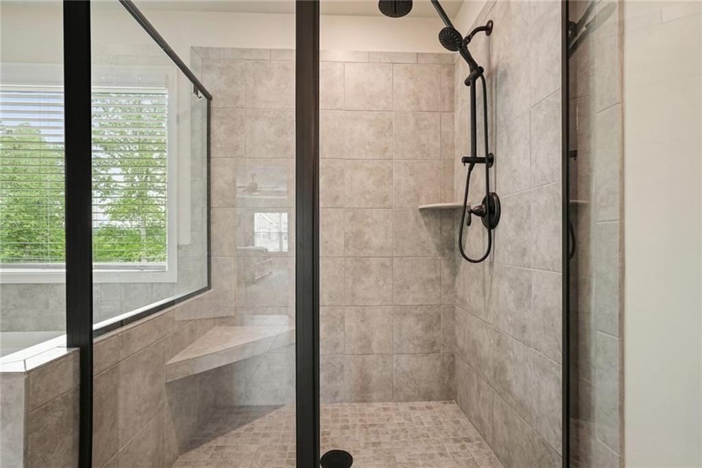 6915 Rambling Vale Dawsonville, GA 30534 - Photo 43 of 63 a bathroom with a shower