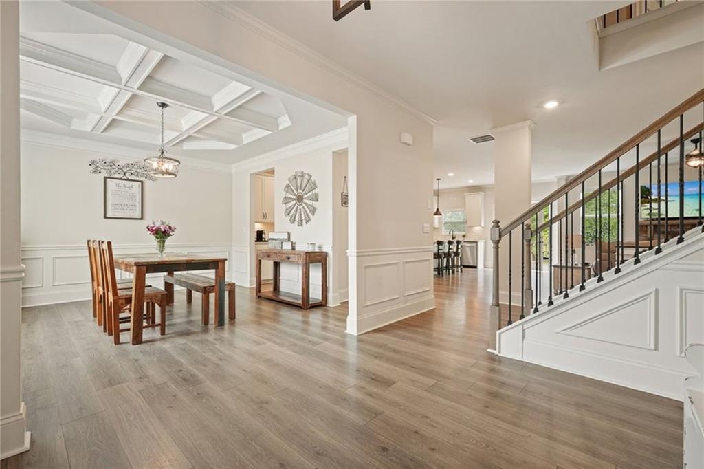 6915 Rambling Vale Dawsonville, GA 30534 - Photo 9 of 63 a view of a livingroom with furniture and a dining table