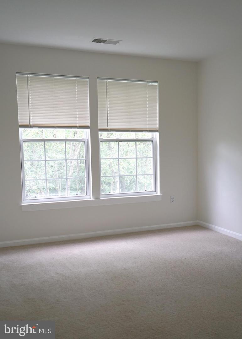 13595 Station Street Germantown, MD 20874 - Photo 6 of 7 an empty room with a window