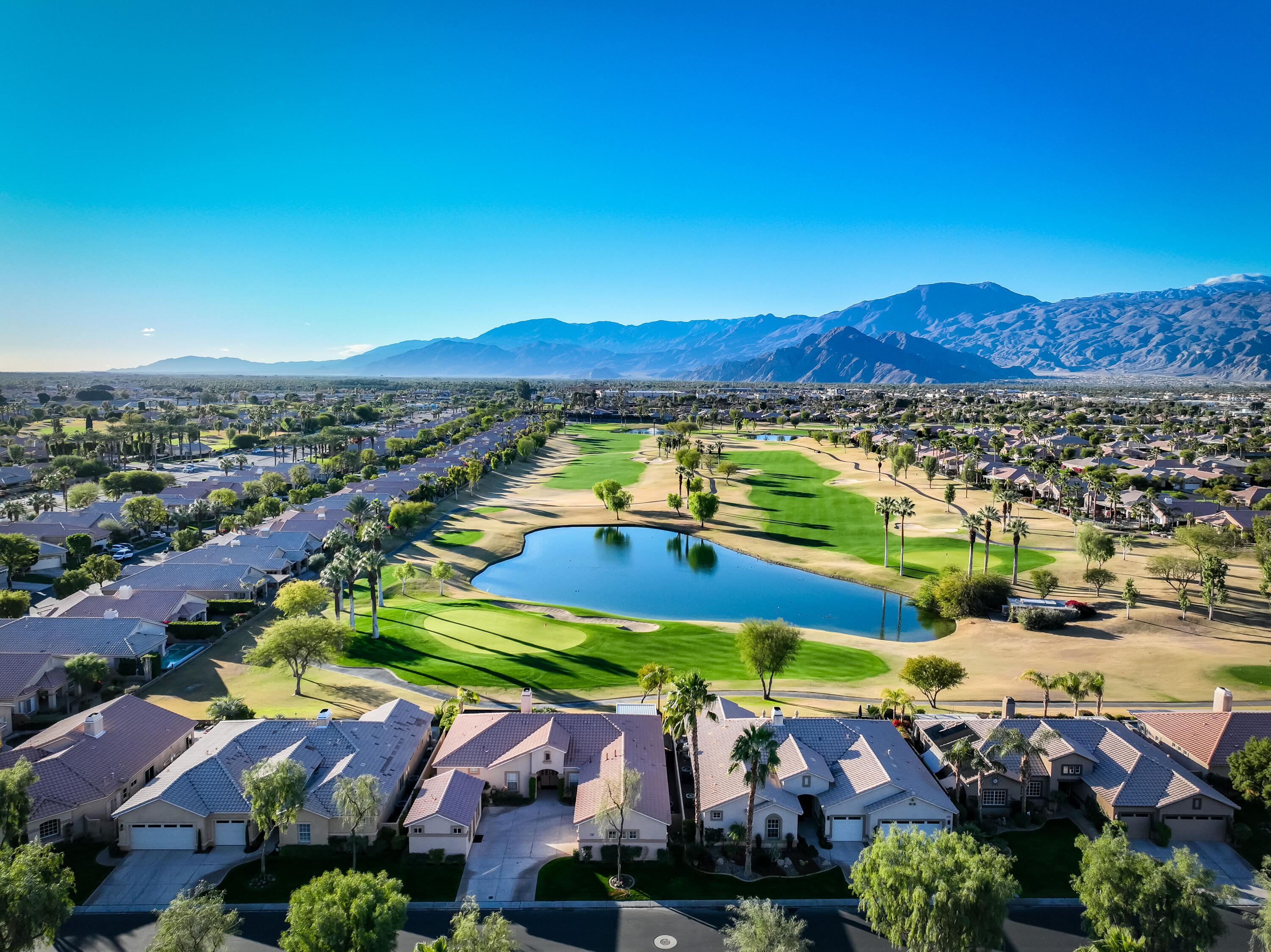 45138 Banff Springs Street Indio, CA 92201 - Photo 38 of 38 an aerial view of residential houses with outdoor space