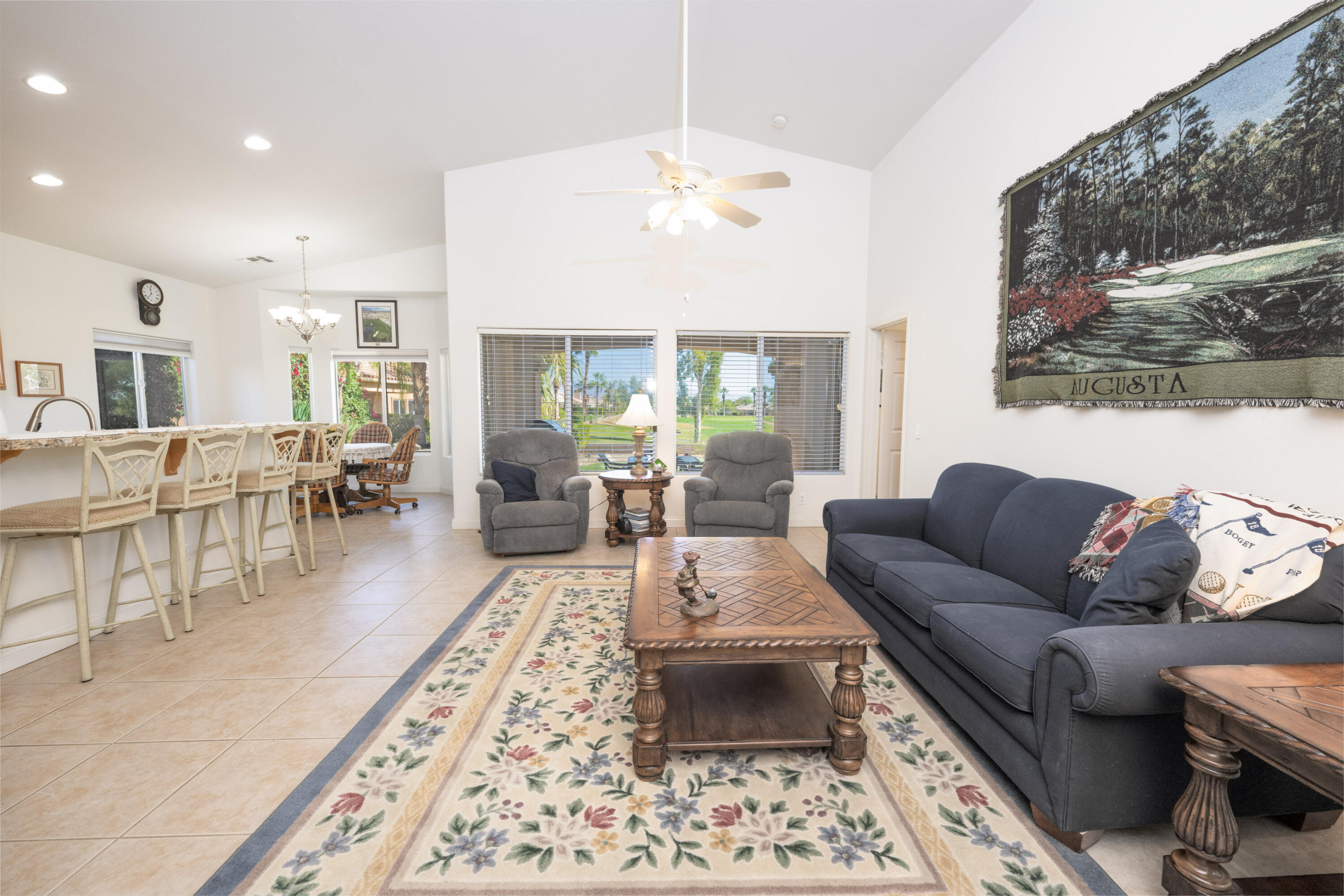45138 Banff Springs Street Indio, CA 92201 - Photo 7 of 38 a living room with furniture and a large window