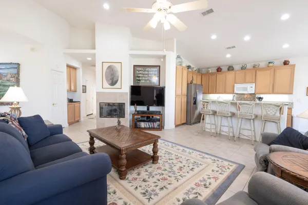 a living room with furniture and a table