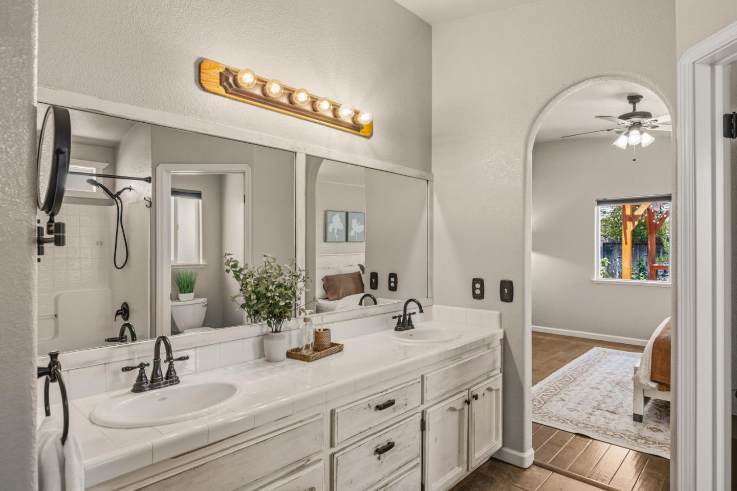 750 Ruger Court Hollister, CA 95023 - Photo 10 of 15 a bathroom with a sink and a mirror