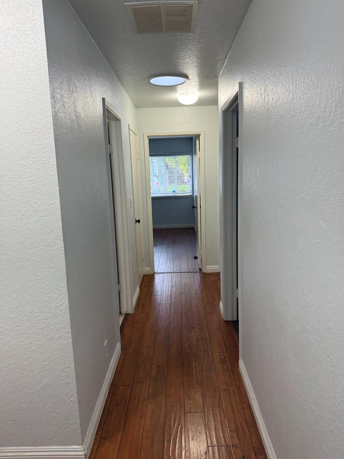 1508 Mable Avenue Modesto, CA 95355 - Photo 16 of 25 a view of entryway with wooden floor