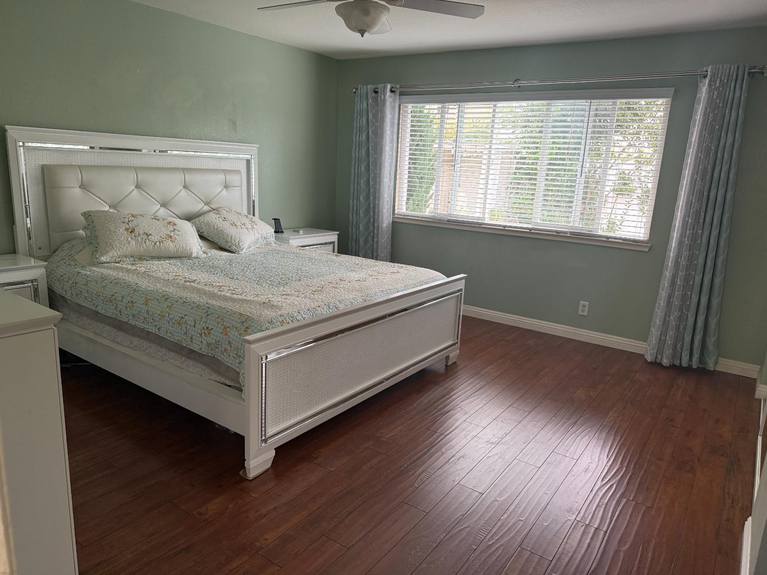 1508 Mable Avenue Modesto, CA 95355 - Photo 22 of 25 a bedroom with a bed and window