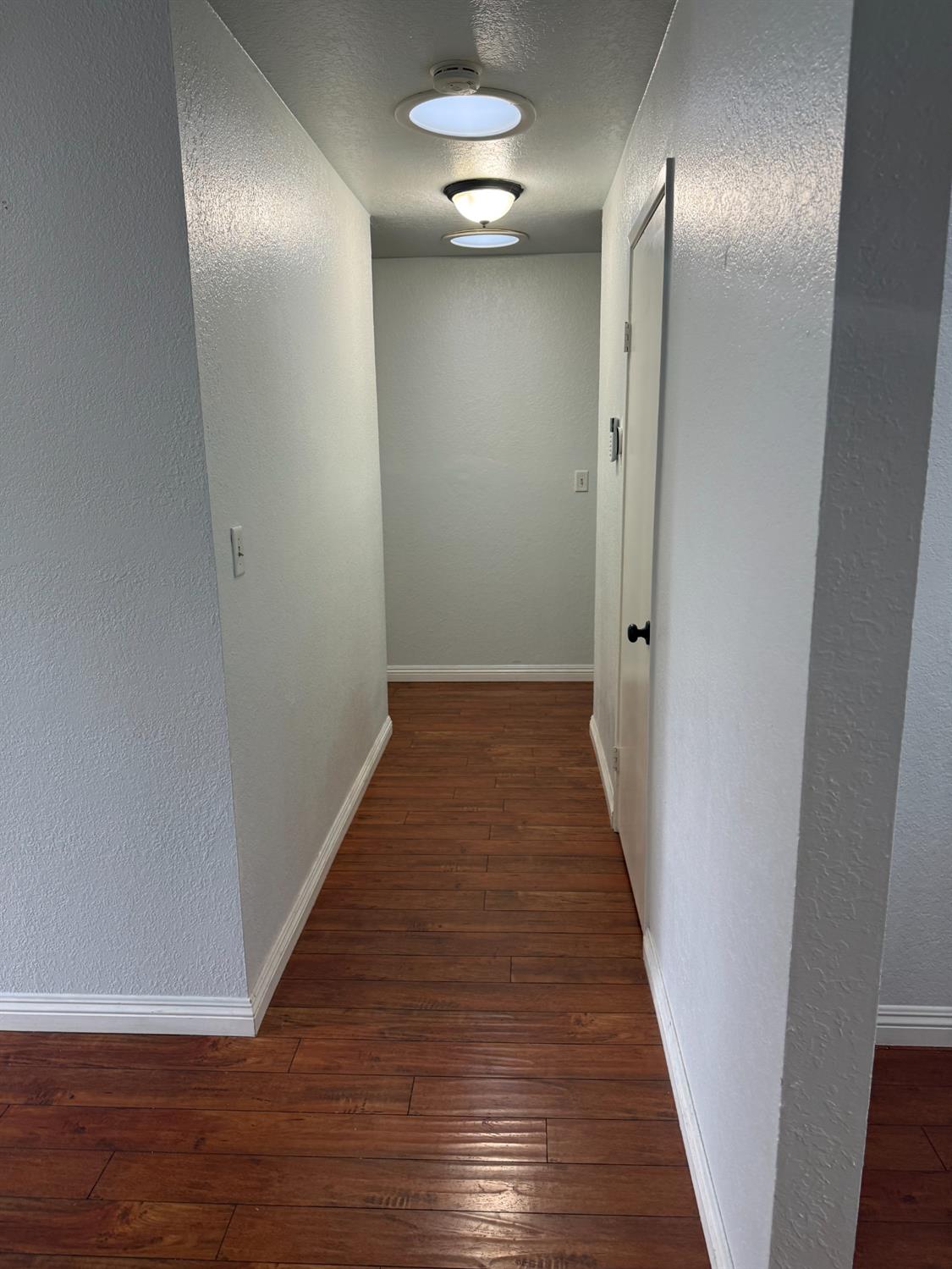 1508 Mable Avenue Modesto, CA 95355 - Photo 23 of 25 a view of a hallway
