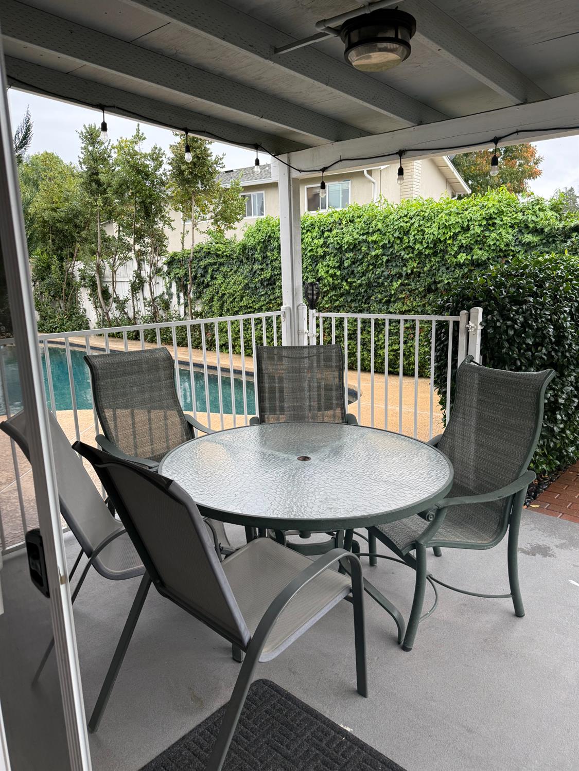 1508 Mable Avenue Modesto, CA 95355 - Photo 8 of 25 a view of a chairs and table in the patio