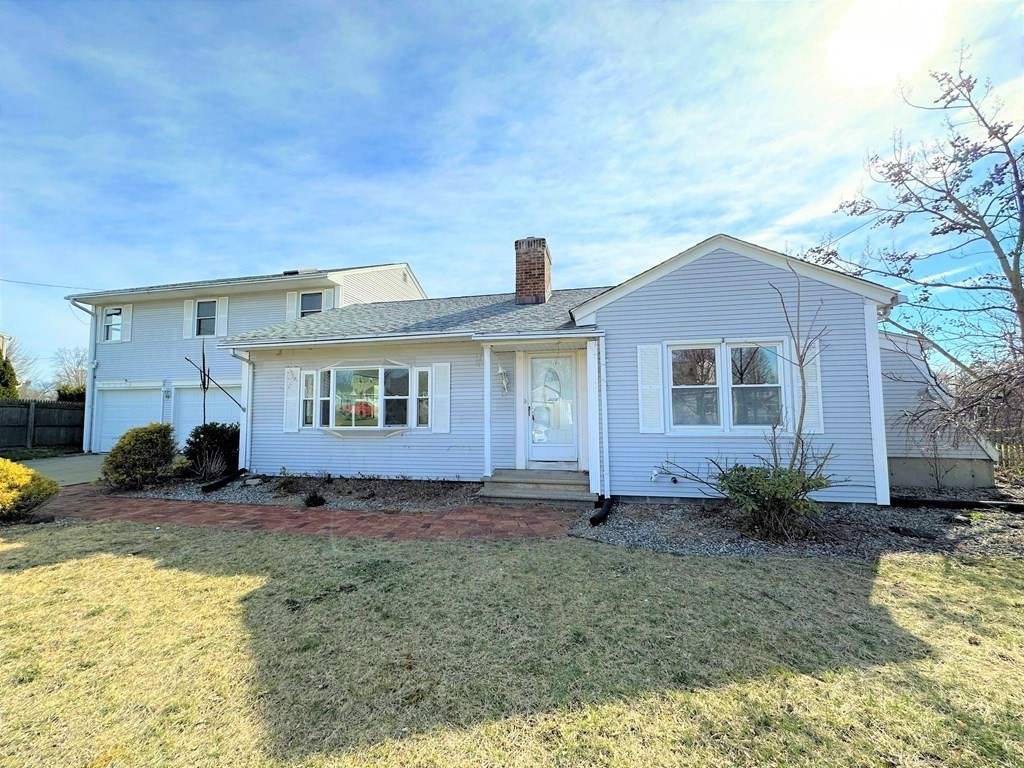 205 Winton Street Springfield, MA 01118 - Photo 3 of 28 a view of a house with yard and sitting area