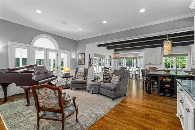 a kitchen with stainless steel appliances granite countertop a stove and a refrigerator
