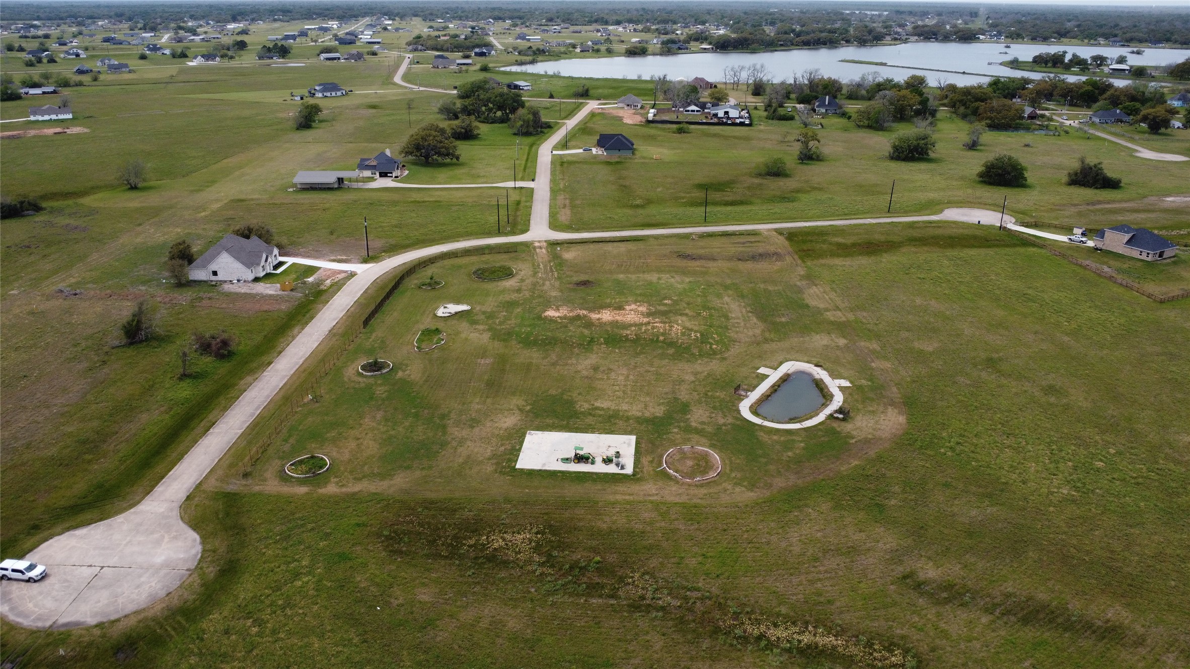 225 Cripple Creek Lane Angleton, TX 77515 - Photo 5 of 13 an aerial view of a house with a swimming pool
