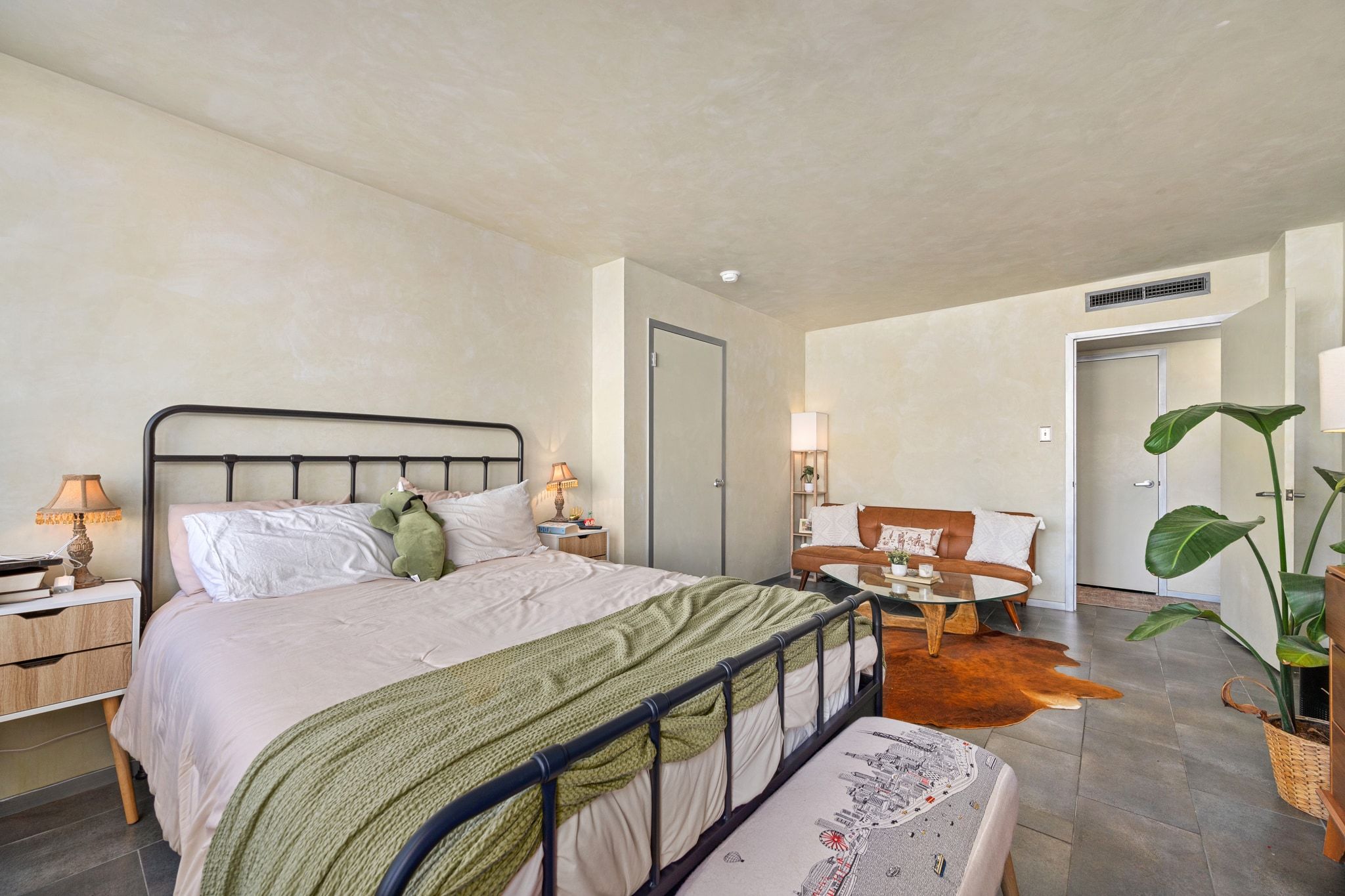 1800 Lavaca Street, Unit A208 Austin, TX 78701 - Photo 11 of 20 a bedroom with double bed and a window