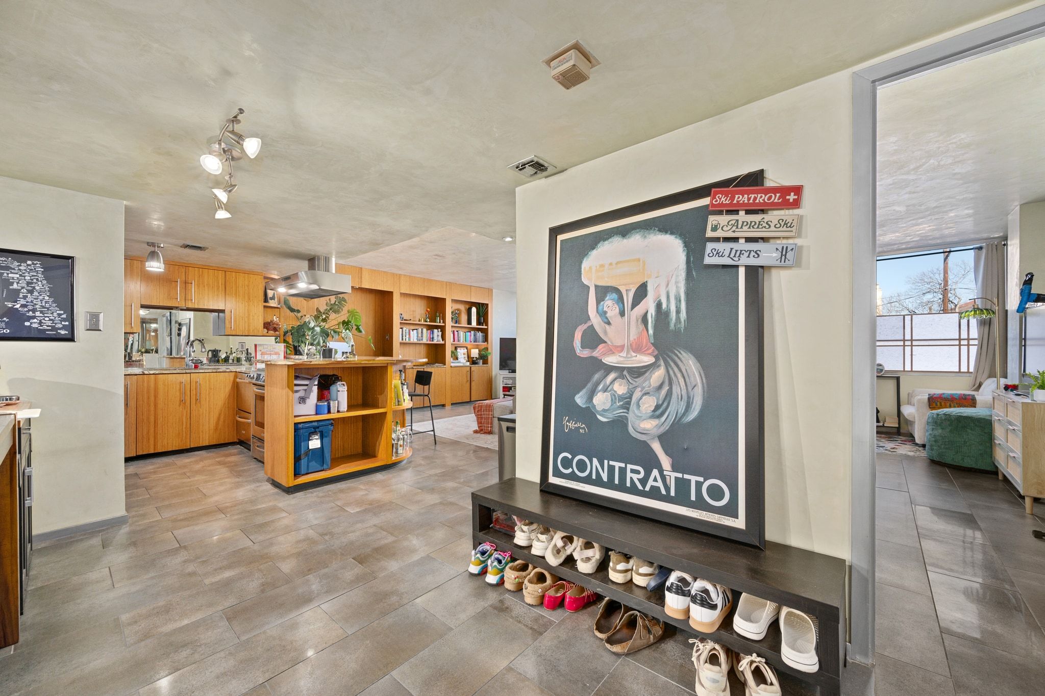 1800 Lavaca Street, Unit A208 Austin, TX 78701 - Photo 14 of 20 a view of a livingroom with furniture and a fan
