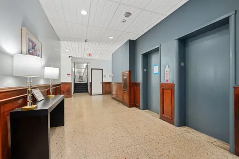 a building with a street sign