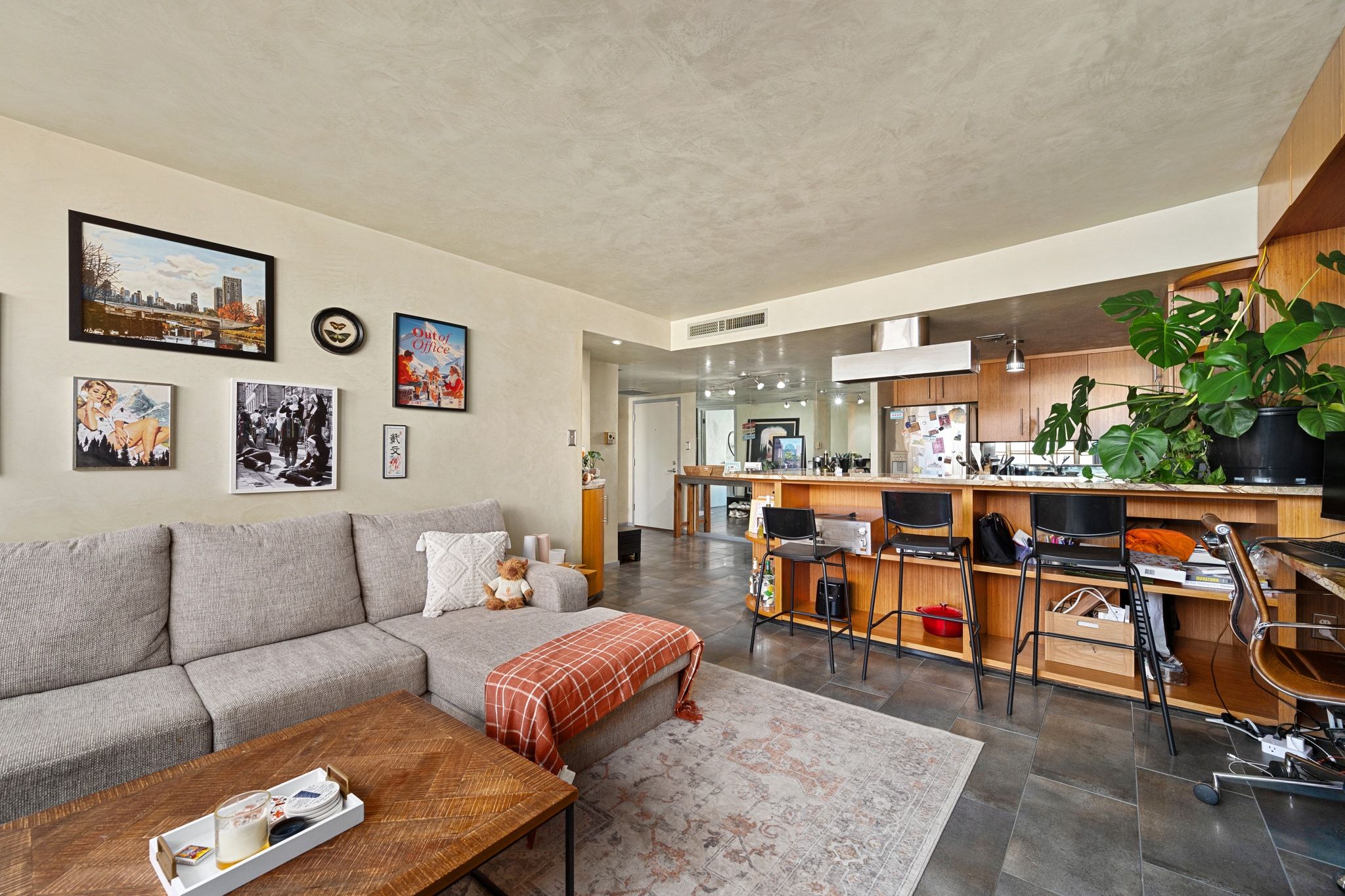 1800 Lavaca Street, Unit A208 Austin, TX 78701 - Photo 4 of 20 a living room with furniture a rug and a large window