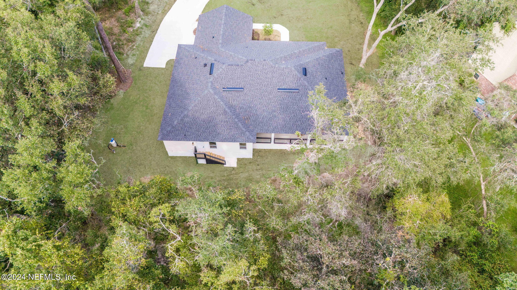 2558 Crooked Creek Point Road Middleburg, FL 32068 - Photo 54 of 56 an aerial view of a house with a yard