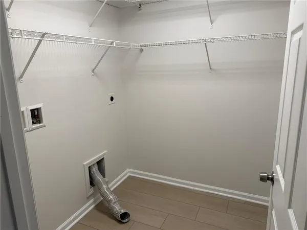 a view of a room with racks on the wall