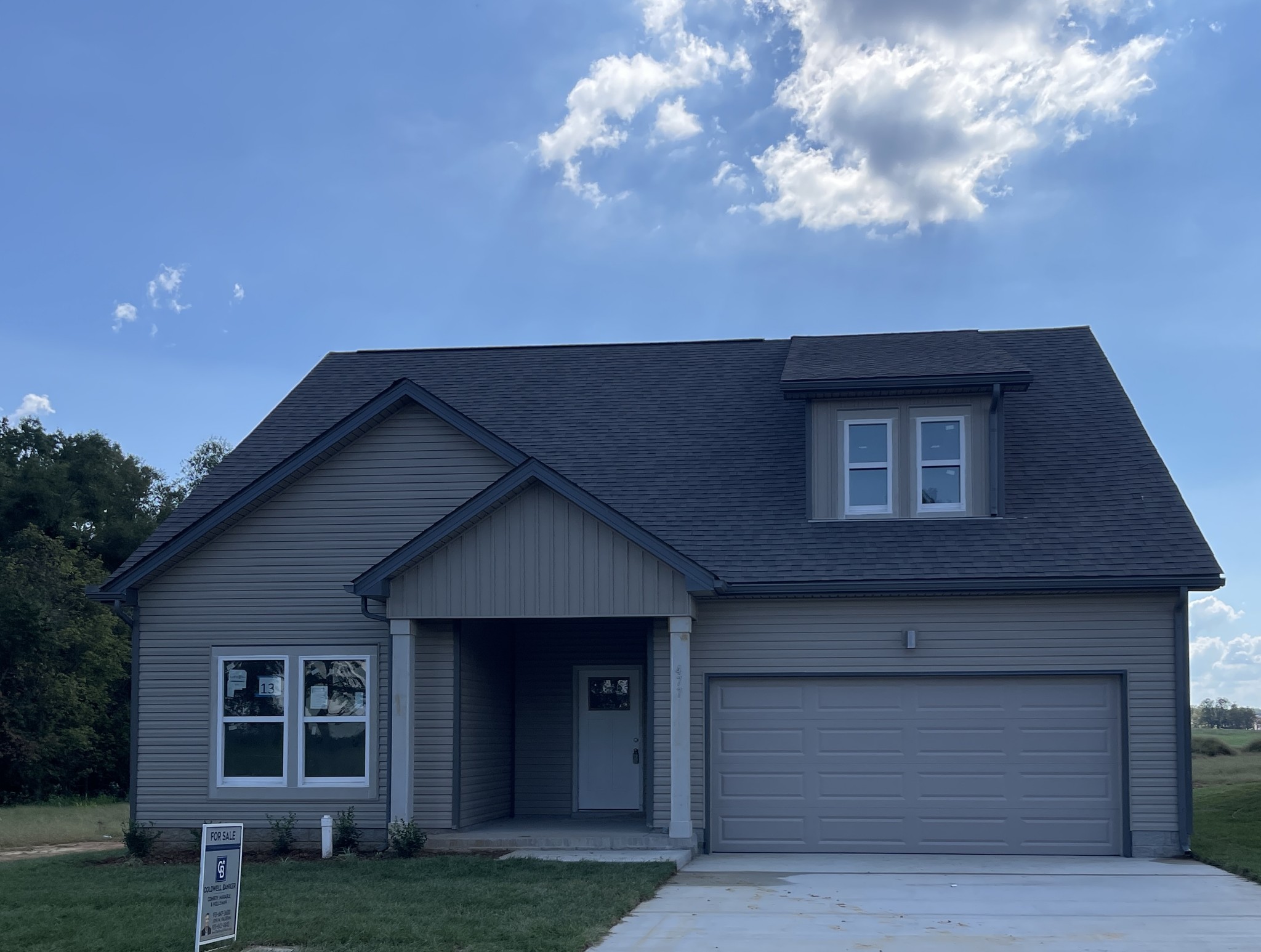 13 Cherry Acres Clarksville, TN 37042 - Photo 1 of 13 a front view of a house with a yard