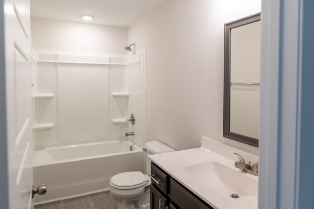 13 Cherry Acres Clarksville, TN 37042 - Photo 13 of 13 a bathroom with a sink a toilet and shower