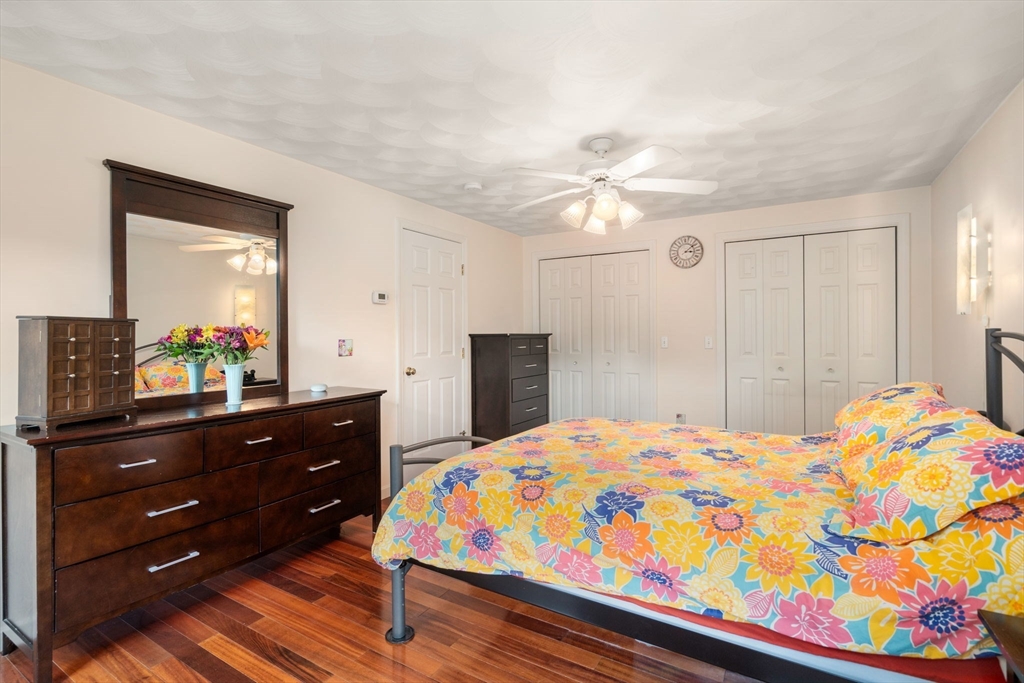 30 Martin Road Douglas, MA 01516 - Photo 15 of 33 a bedroom with a bed and a dresser