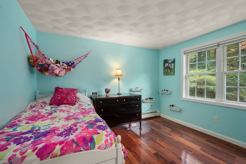 30 Martin Road Douglas, MA 01516 - Photo 16 of 33 a bedroom with a bed dresser and a window