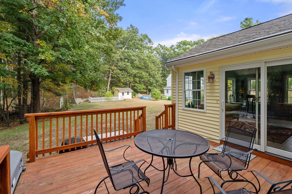 30 Martin Road Douglas, MA 01516 - Photo 21 of 33 a view of a chair and tables in the balcony