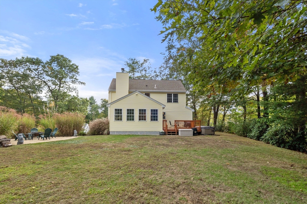 30 Martin Road Douglas, MA 01516 - Photo 24 of 33 a front view of a house with a yard and mountain view