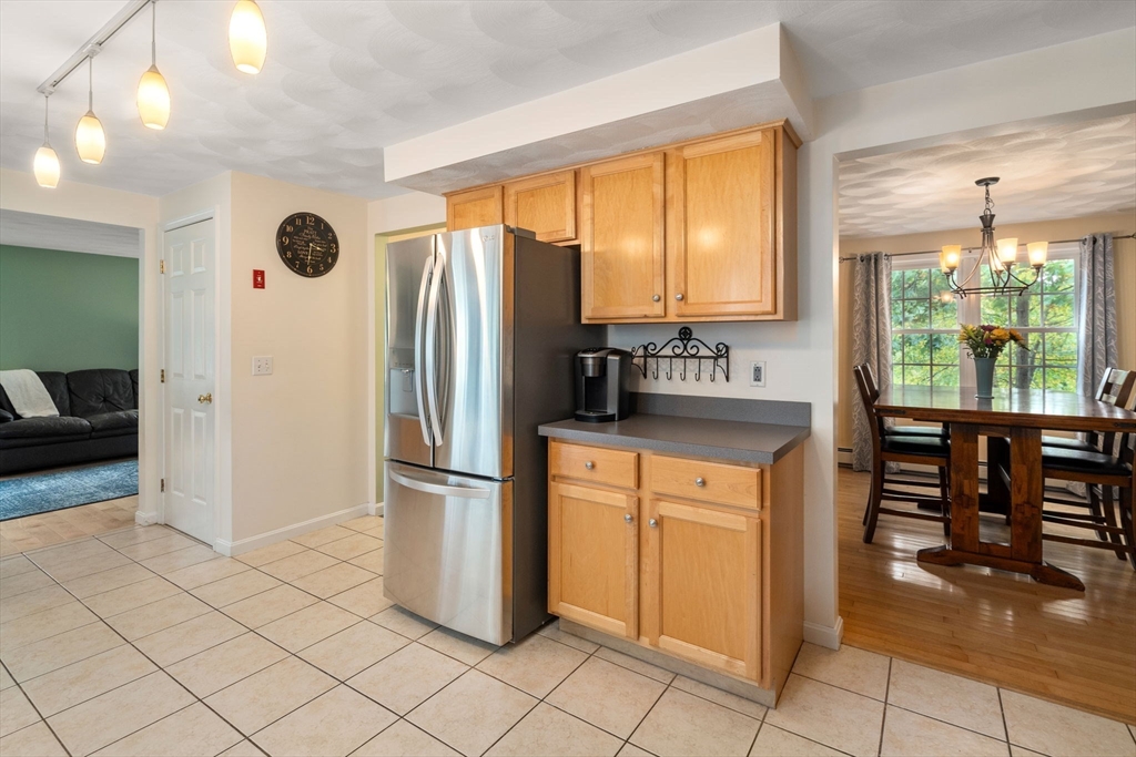 30 Martin Road Douglas, MA 01516 - Photo 9 of 33 a kitchen with stainless steel appliances granite countertop a refrigerator and a sink