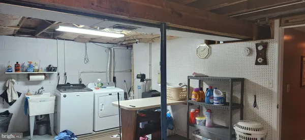 a storage room with washer and dryer