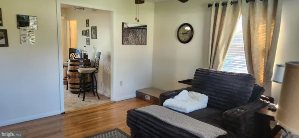 a view of livingroom with furniture and wooden floor