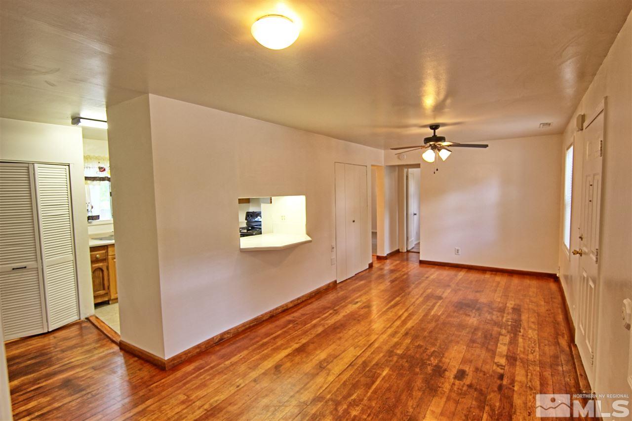 4575-4571 Alcorn Road Fallon, NV 89406 - Photo 17 of 25 a view of a livingroom with wooden floor