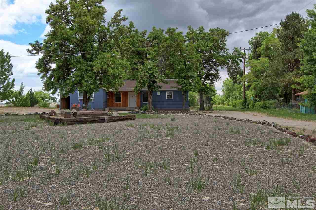 4575-4571 Alcorn Road Fallon, NV 89406 - Photo 4 of 25 a view of a house with backyard and trees