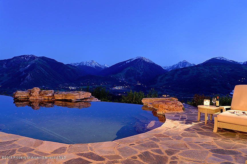 189 Larson Road Aspen, CO 81612 - Photo 16 of 28 a view of a chairs and table in the patio
