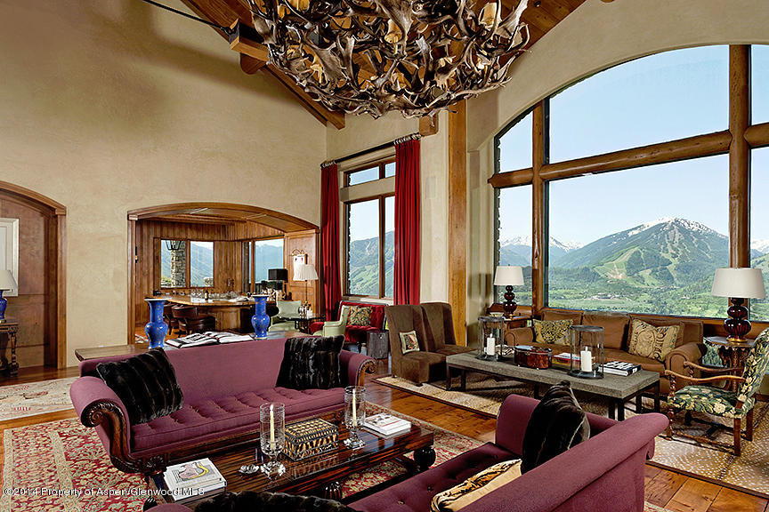 189 Larson Road Aspen, CO 81612 - Photo 24 of 28 a living room with furniture and large windows