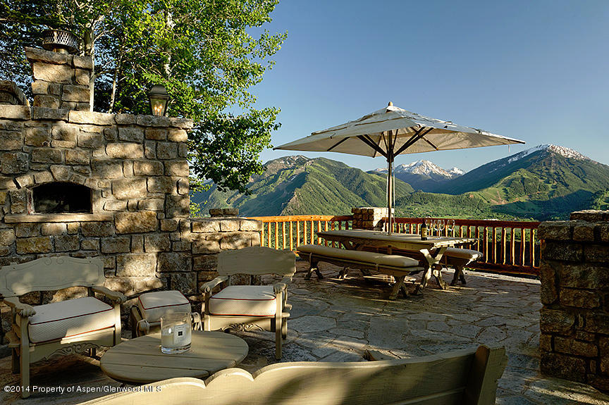 189 Larson Road Aspen, CO 81612 - Photo 3 of 28 a view of a swimming pool with a patio