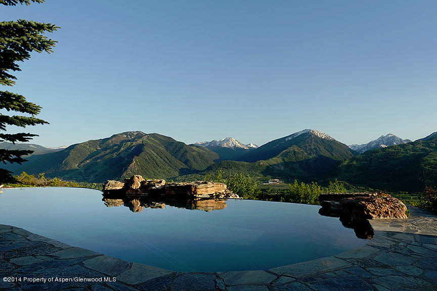 189 Larson Road Aspen, CO 81612 - Photo 5 of 28 a view of a lake with mountain in the background