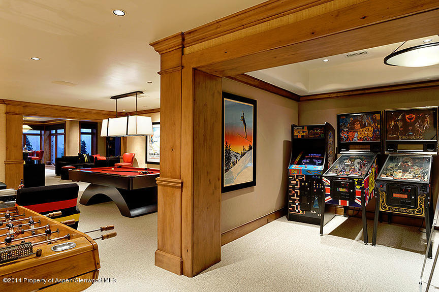 189 Larson Road Aspen, CO 81612 - Photo 6 of 28 a living room with lots of furniture and a flat screen tv