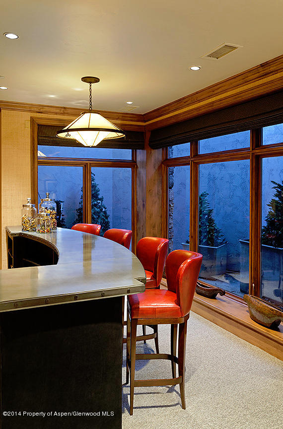 189 Larson Road Aspen, CO 81612 - Photo 8 of 28 a view of a dining room with furniture and chandelier